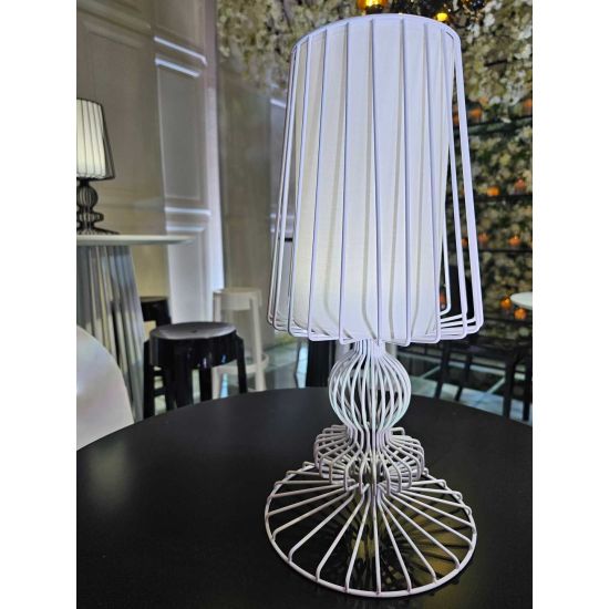 White wire-frame table lamp with open cage shade and round base, clean accent lighting for weddings and modern event décor setups.