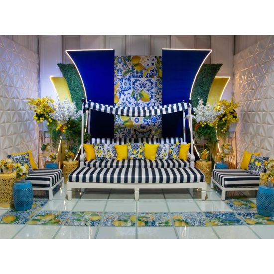 Maze bench with navy-and-white striped cushion and white base, modern lounge seating for outdoor events, weddings, and parties.