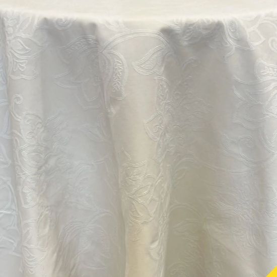 Cream Milos event tablecloth with subtle textured weave for weddings, receptions, and elegant table décor