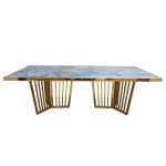Lucerne Reflection dining table with gold metal frame and blue marbled acrylic top, glossy rectangular tabletop and sculptural base for upscale events.