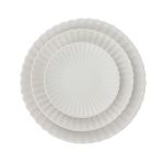 White petal-rim dessert plate with radiating ridges and a smooth center, small round plate on a white background