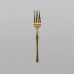 Shiny gold dinner fork with classic slim handle, premium disposable flatware set of 10 for banquets, weddings, and place settings.