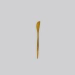 Gold butter knife with slim modern handle, elegant disposable flatware set of 10 for weddings, brunches, and upscale event tables.