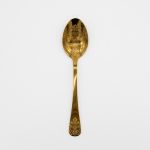 Gold Casa Blanca dinner spoon with ornate patterned handle