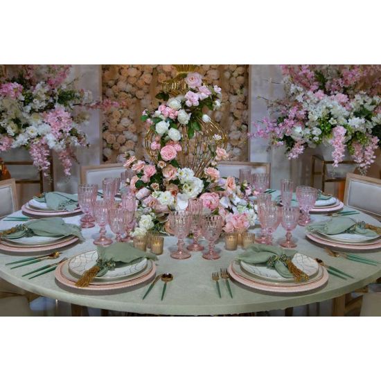 Gold dinner spoon with light green handle, stylish flatware for catered events, weddings, and polished tablescapes.