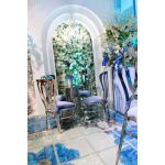Silver metal event chair with heart-shaped double-oval backrest and Royal Blue upholstered seat cushion