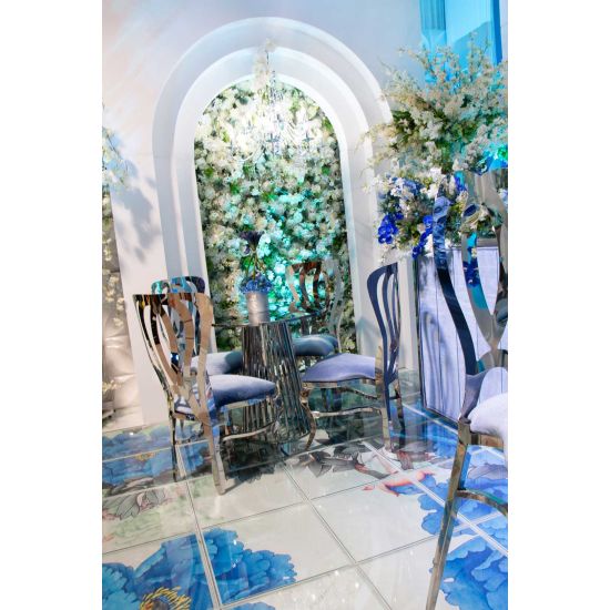 Silver metal event chair with heart-shaped double-oval backrest and Royal Blue upholstered seat cushion