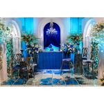 Silver metal event chair with heart-shaped double-oval backrest and Royal Blue upholstered seat cushion