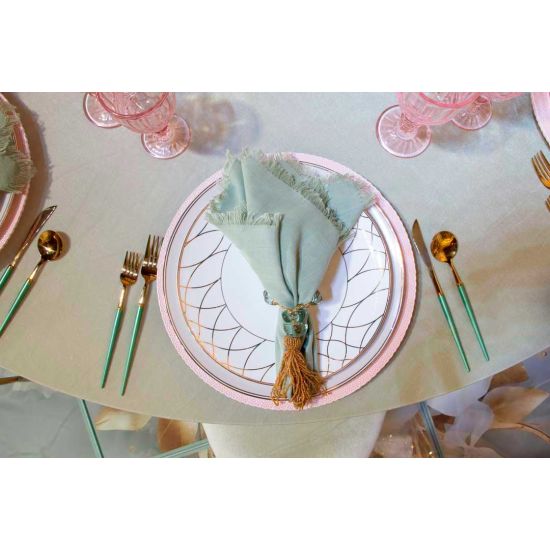 Gold dinner spoon with light green handle, stylish flatware for catered events, weddings, and polished tablescapes.