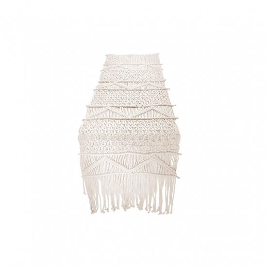 Cream macramé boho table runner with tassels and textured woven pattern, rustic wedding table décor.