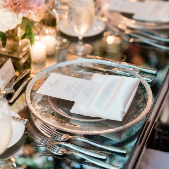 Clear cloud charger plate with subtle texture and wide silver rim, refined glass charger for formal weddings and upscale events