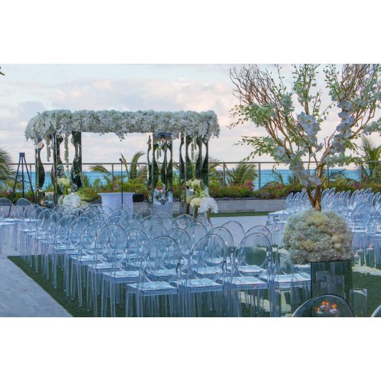 Pair of tall geometric columns in white and black with mirrored interior panels, modern event pedestals for décor and displays.