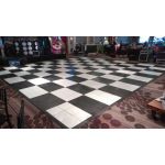 Black snap-lock dance floor shown as modular panel square, 15x15 layout using 3x3 sections for parties, events, and dance setups.