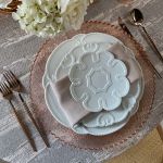 Bella white salad plate with ornate raised scroll border and beaded rim detail, round classic design on a white background for weddings