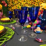 Saint Louis cobalt blue champagne goblet with clear stem and base, elegant colored event glassware for weddings and toasts.
