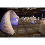 White inflatable event arch with smooth curved design, modern decorative structure ideal for entrances, photo backdrops, and special event styling