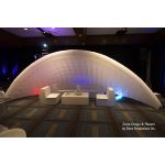 White inflatable event arch with smooth curved design, modern decorative structure ideal for entrances, photo backdrops, and special event styling