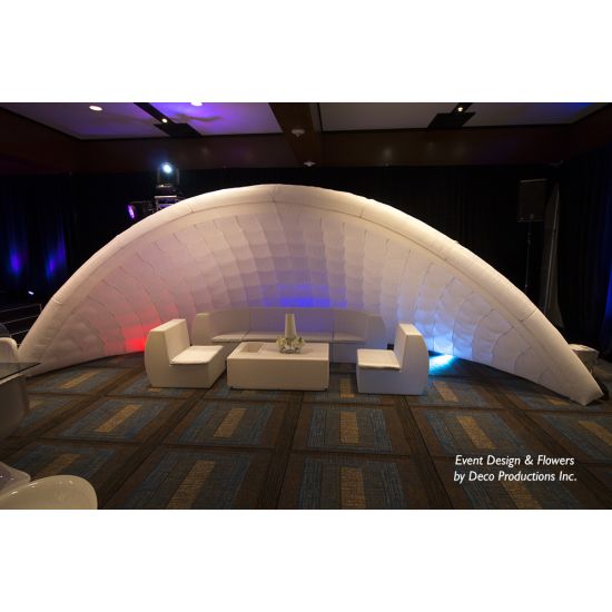 White inflatable event arch with smooth curved design, modern decorative structure ideal for entrances, photo backdrops, and special event styling