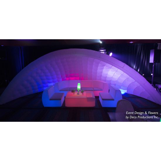 White inflatable event arch with smooth curved design, modern decorative structure ideal for entrances, photo backdrops, and special event styling