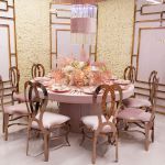 Round crystal lamp with clear faceted panels on gold stand base, glamorous event accent lighting for weddings and lounge décor.