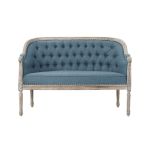 Vintage Faye loveseat with distressed wood frame and tufted dusty blue upholstery, elegant lounge seating for weddings and events.