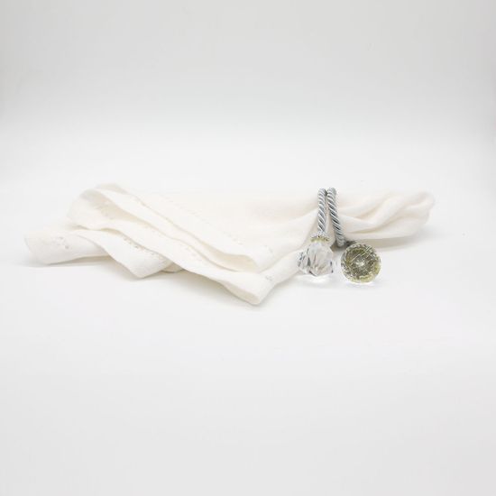 Diamond rope napkin holder with twisted rope-style band and sparkling diamond accents securing a folded white cloth napkin for elegant tables