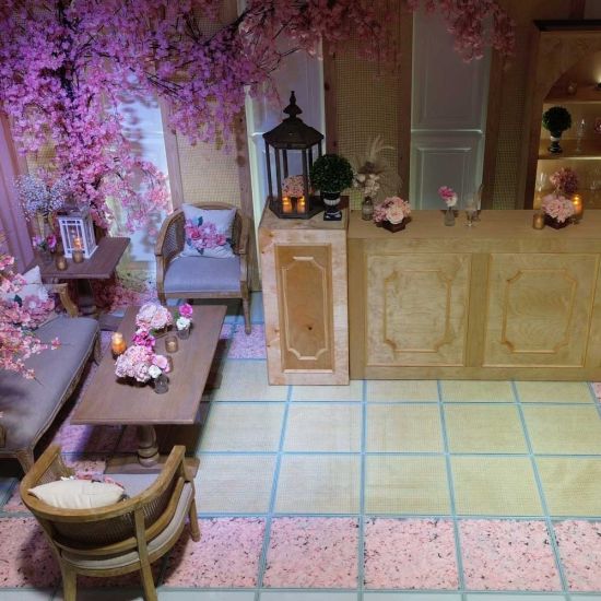Natural wood colonial-style pedestal column with paneled cabinet-like design, rustic event decor display stand for weddings and props.
