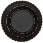 Matte black petal-textured salad plate with scalloped rim and radiating ridges, round plate on a white background