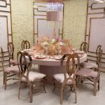 Gold geometric screen with white center panel and art deco line design, freestanding backdrop for weddings, lounges, and event décor.