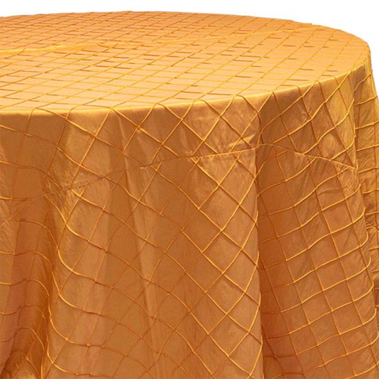 bright orange pintuck round event tablecloth linen with textured pleated pattern for weddings, parties and special occasion décor rentals