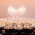 Reflection Serpentine gold table with stainless steel top, curved serpentine dining table with gold legs for luxury event rentals and décor.
