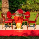 48 × 48 inch glass top high boy cocktail table with mirrored gold inverted pyramid stainless steel base for luxury event rental