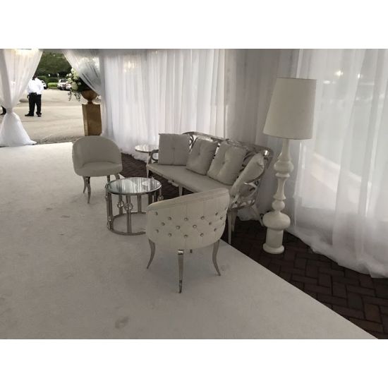 Reflection butterfly loveseat with silver metal cutout backrest and White velvet seat cushion, elegant modern seating for upscale events.