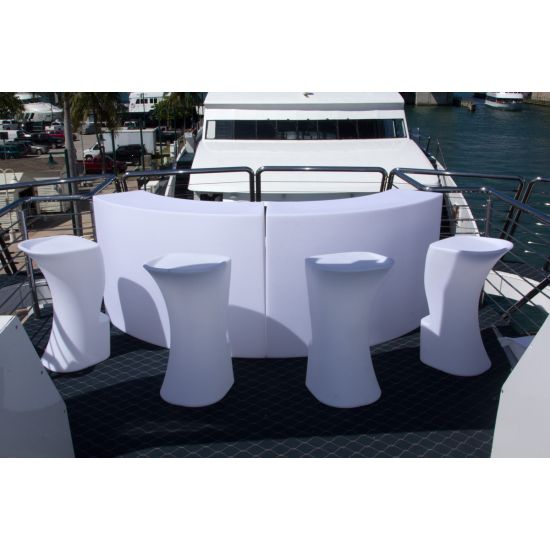Serpentine white LED-lit South Beach Glow bar rental unit with wave-shape front for modern luxury event cocktail stations