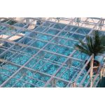 Clear acrylic stage platform 2x4 with metal truss base, modular riser for events, runway staging, and performances.