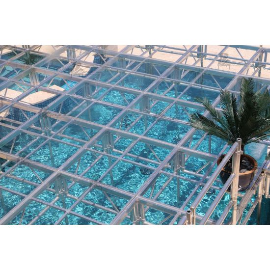 Clear acrylic stage platform 2x4 with metal truss base, modular riser for events, runway staging, and performances.